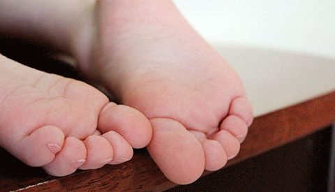 Close-up of the soles of two bare feet